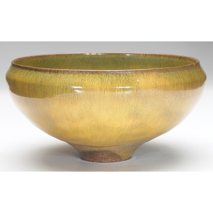 Appraisal: Natzler bowl footed shape covered in a Dawn glaze with