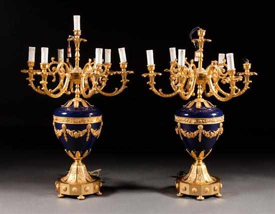 Appraisal: Pair of Louis XV style gilt-metal and enameled metal seven-light