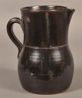 Appraisal: Antique Manganese Glazed Stoneware Pitcher h