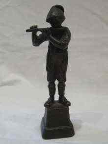 Appraisal: A bronze figure of a boy playing the flute ht