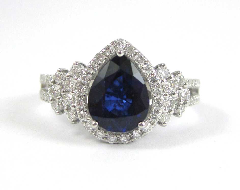 Appraisal: SAPPHIRE DIAMOND AND FOURTEEN KARAT GOLD RING The white gold