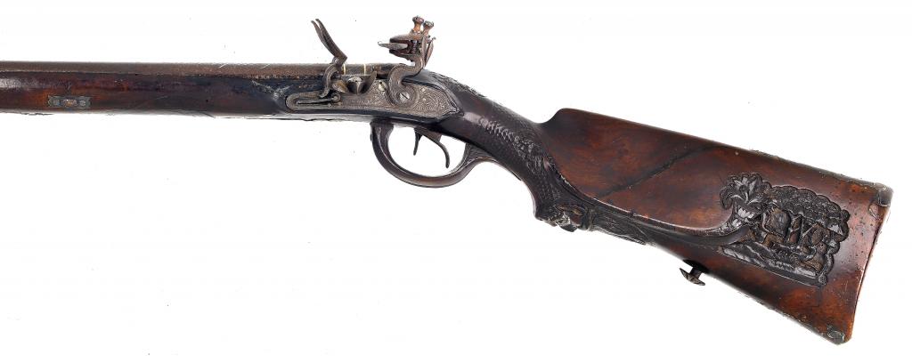 Appraisal: A DOUBLE BARRELLED FLINTLOCK SPORTING GUN the barrels engraved with