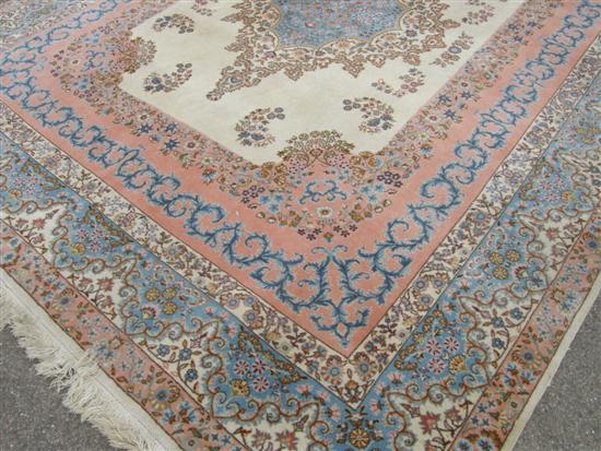 Appraisal: Persian style cream ground carpet the centre with a blue