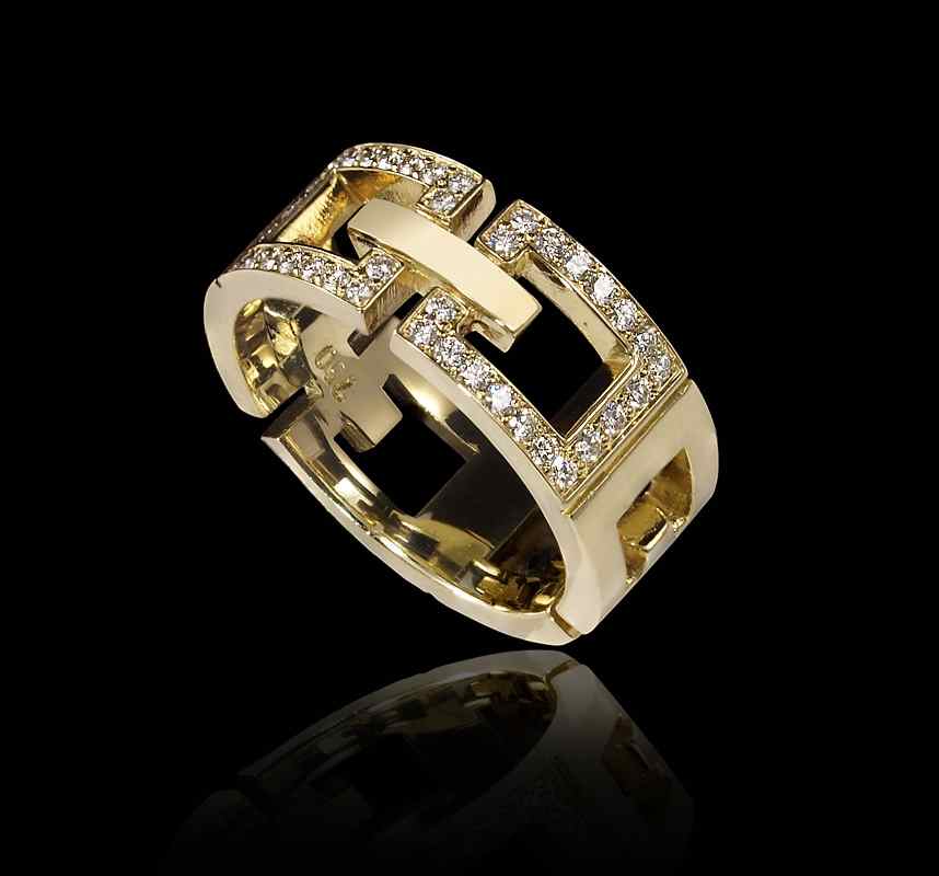 Appraisal: RON HAMI K DIAMOND BAND RING K yellow gold ring