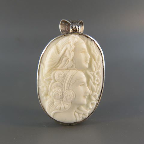 Appraisal: Cameo Pendant double profile of ladies sterling silver frame