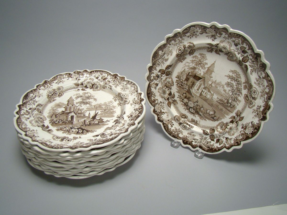 Appraisal: TWELVE EARLY BROWN AND WHITE STAFFORDSHIRE SERVICE PLATES Mid- th