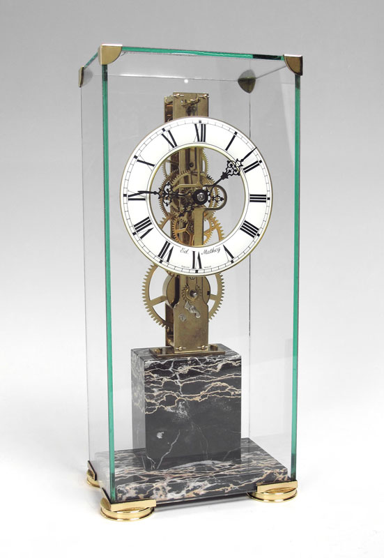 Appraisal: MATHEY SKELETON CLOCK Metal face with Roman numerals marked Ed