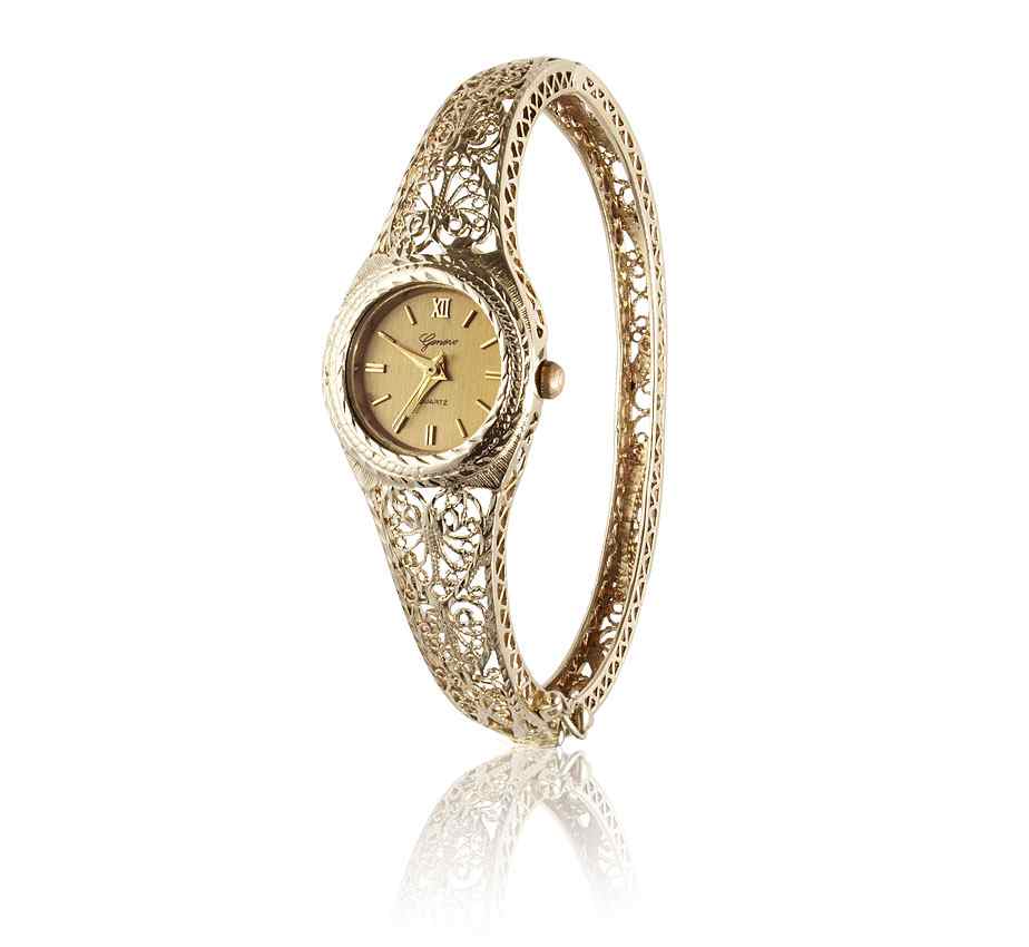 Appraisal: k GOLD FILIGREE LADIES BANGLE WATCH yellow gold filigree hinged