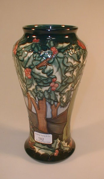 Appraisal: A modern Moorcroft vase with holly leaf and berry decoration