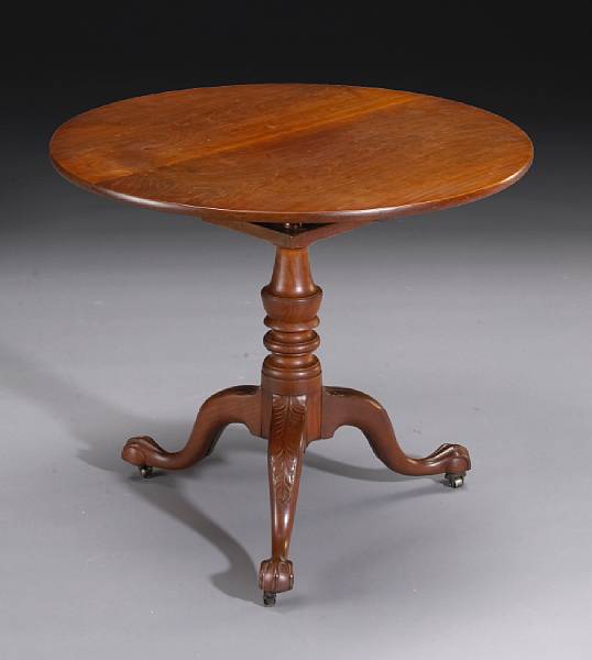 Appraisal: A Chippendale carved cherry tilt top birdcage tea table late