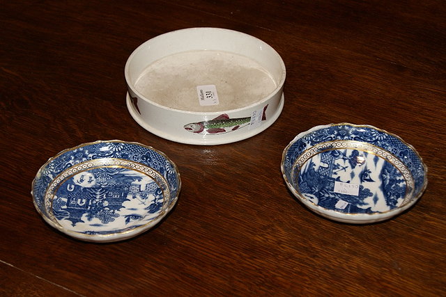 Appraisal: French potttery char dishcirca and two Caughley saucer dishes