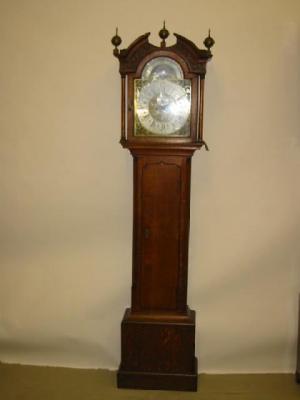 Appraisal: AN OAK EIGHT DAY LONGCASE CLOCK by Thomas Travis Thorn