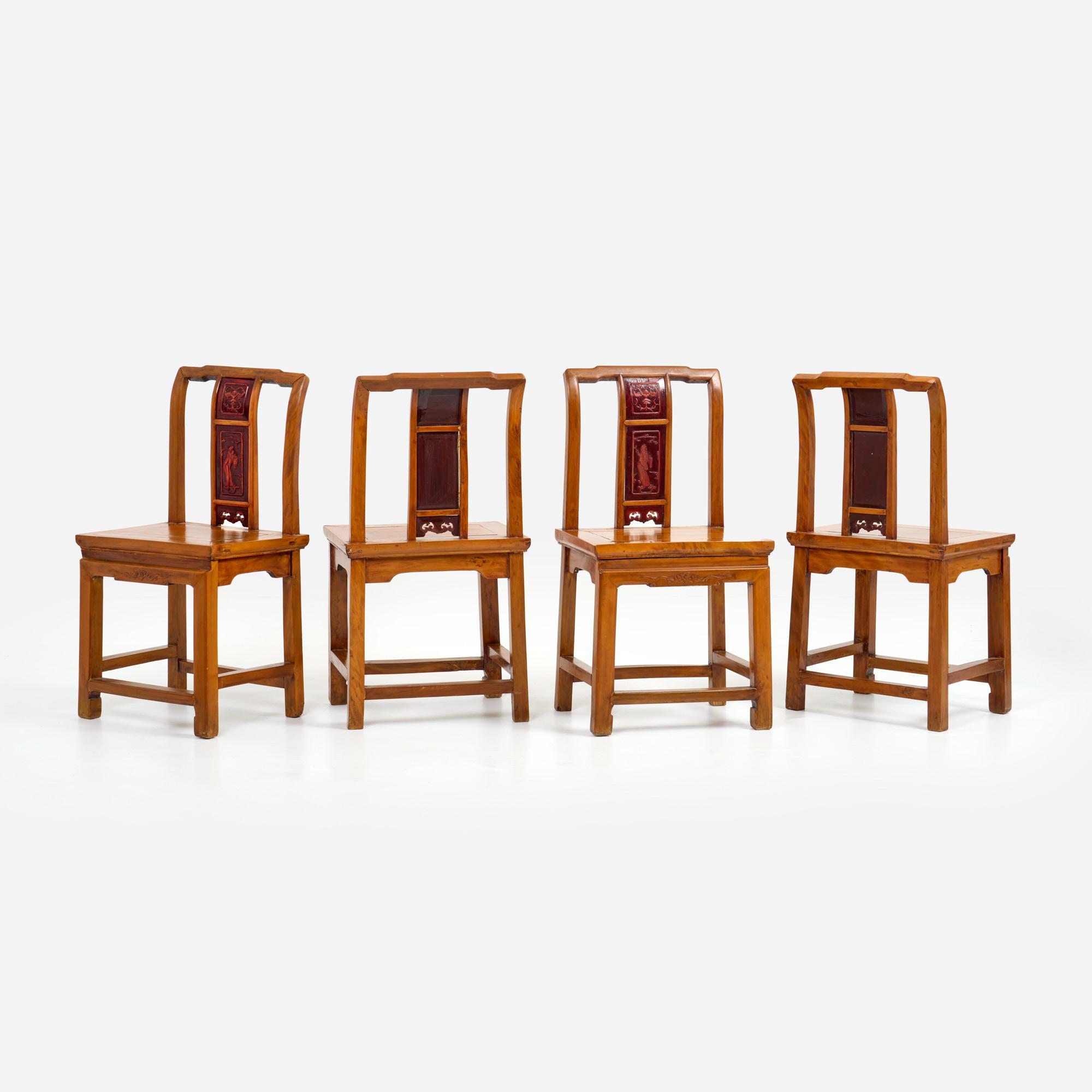 Appraisal: FOUR CHINESE ELM CHAIRS WITH IMMORTAL SCHOLAR SPLATS A set