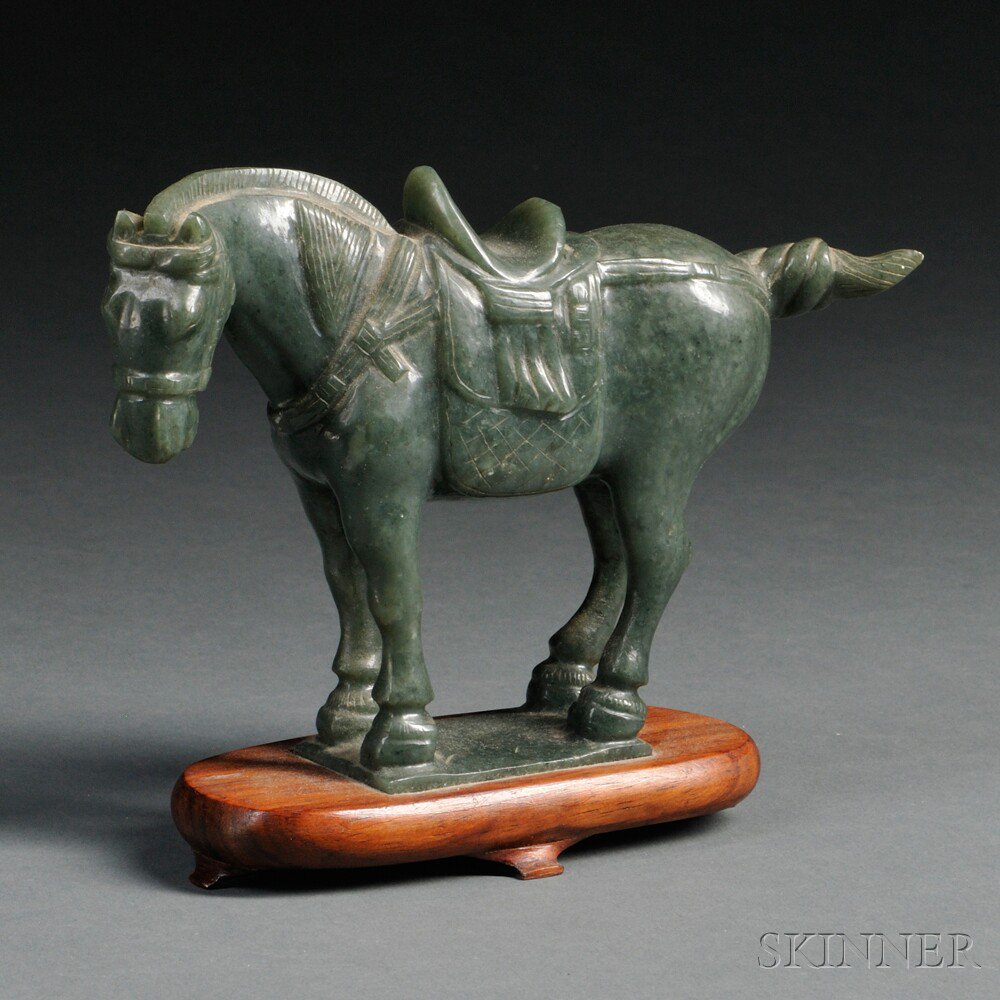 Appraisal: Carved Hardstone Horse China spinach green stone mounted on a