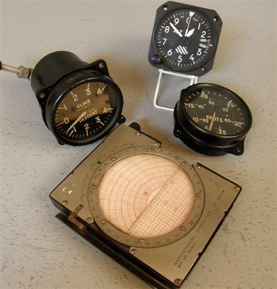 Appraisal: Four World War II Aircraft cockpit instruments Navigational computer Mk