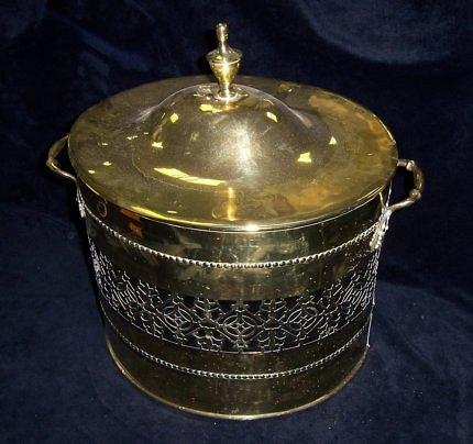 Appraisal: An early th Century oval brass log bucket and cover