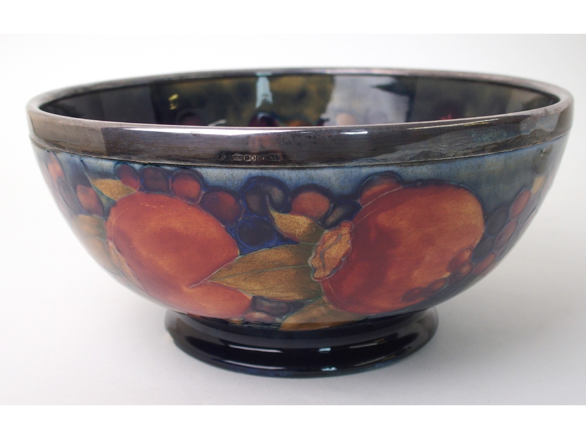 Appraisal: A Moorcroft Pomegranate pattern bowl def