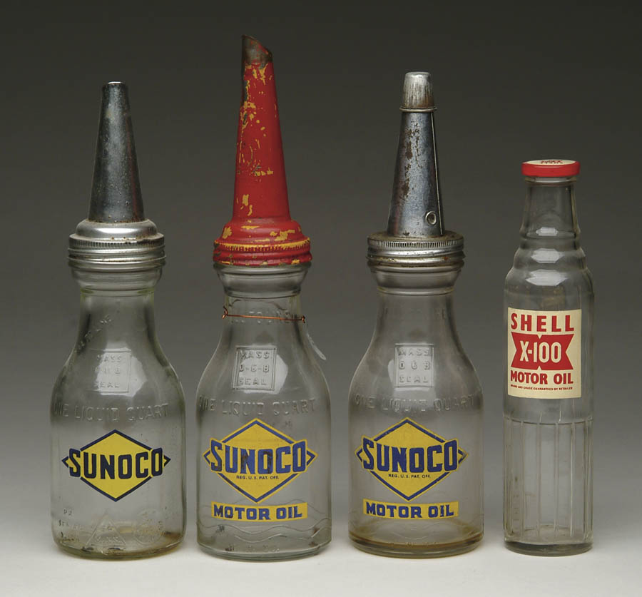 Appraisal: LOT OF FOUR GLASS MOTOR OIL CONTAINERS Includes three Sunoco