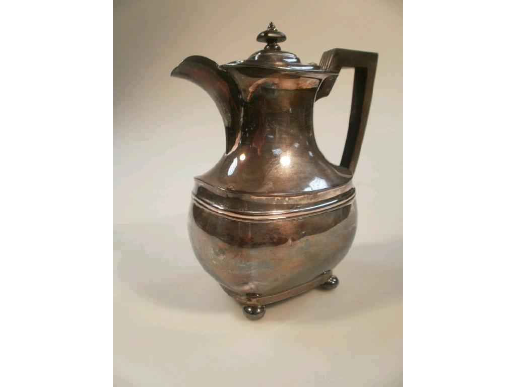 Appraisal: A George V silver hot water jug Sheffield