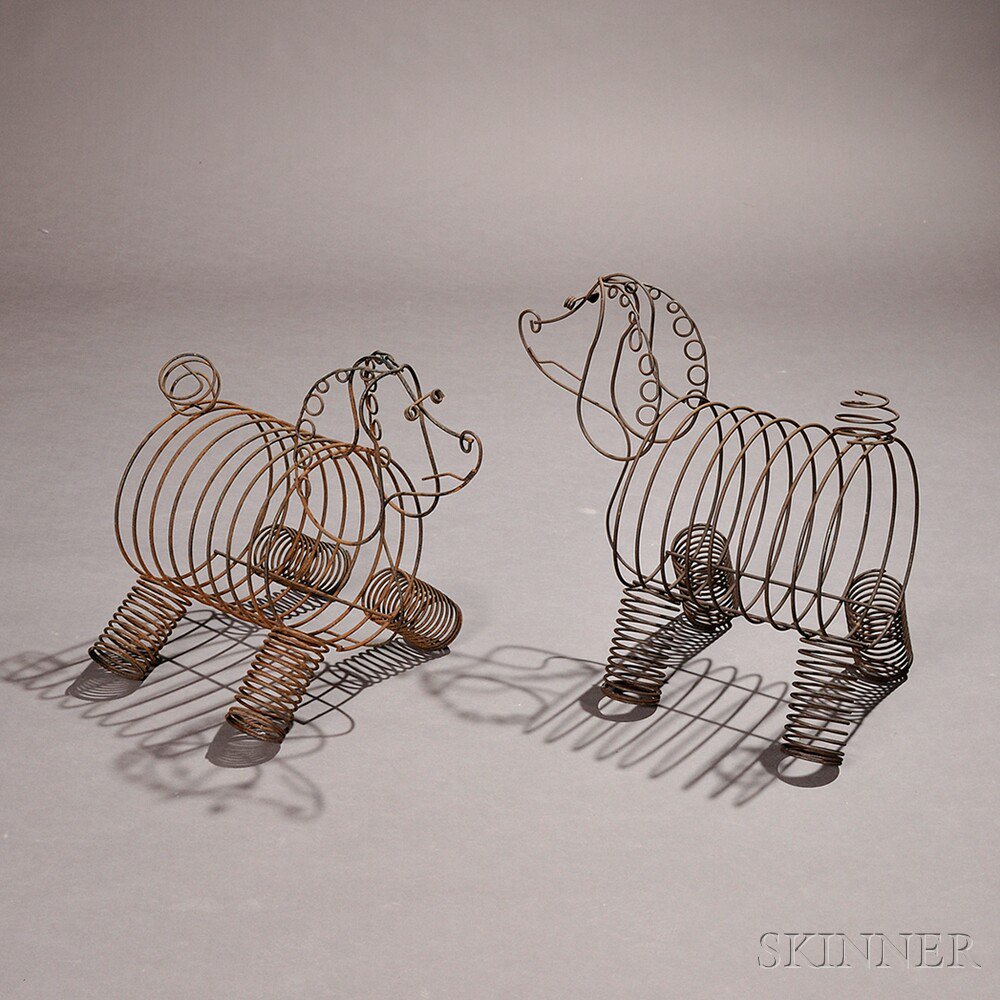 Appraisal: Two Wire Rod Dog-form Magazine Holders mid- th century the