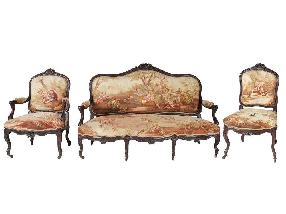 Appraisal: FRENCH CARVED THREE-PIECE SALON SUITEfruitwood comprising a settee inches wide