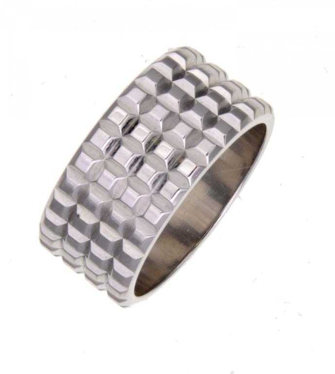 Appraisal: A BOUCHERON WHITE GOLD RING in the form of knurled