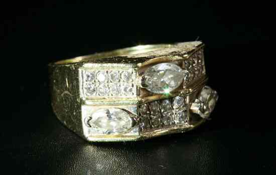 Appraisal: K YELLOW GOLD AND DIAMOND RING Signed Toliro Faceted top