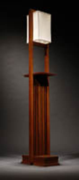 Appraisal: A Frank Lloyd Wright designed walnut floor lamp A Frank