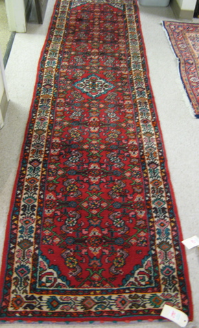 Appraisal: PERSIAN HAMADAN RUNNER overall Herati floral design on red ground