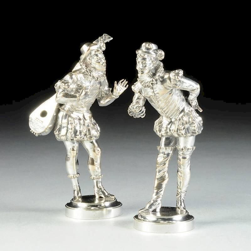 Appraisal: A PAIR OF CONTINENTAL SILVER PLATED BRONZE MINSTREL FIGURES SIGNED