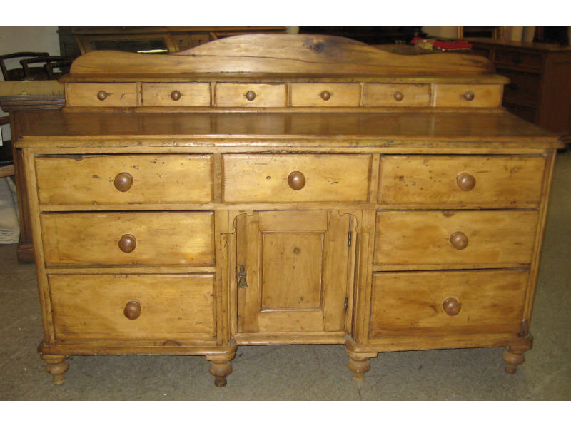 Appraisal: ENGLISH PINE SIDEBOARD Rectangular top set with a row of