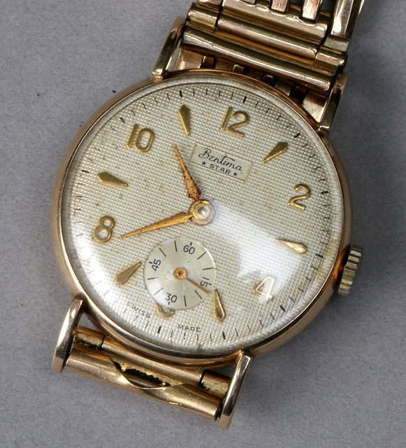 Appraisal: A GENTLEMAN'S CT GOLD BENTIMA STAR WRIST WATCH with enamelled