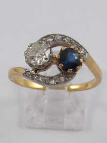 Appraisal: A yellow metal tests high carat gold sapphire and diamond