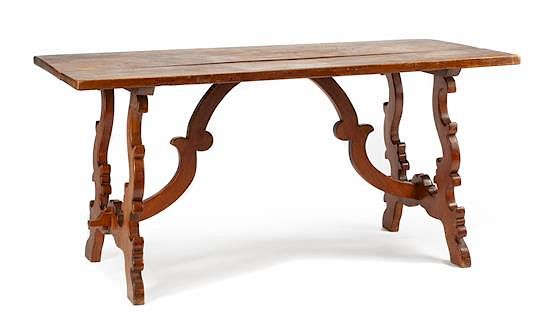 Appraisal: A Spanish Renaissance Style Walnut Trestle Table Height x width