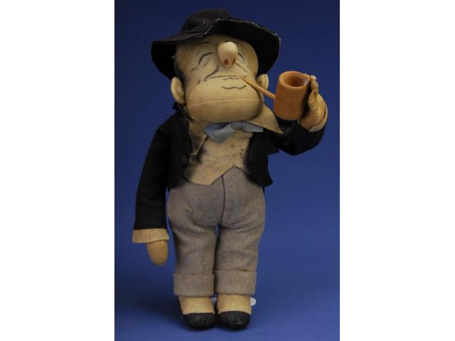 Appraisal: Cloth Character Man with Pipe America ca a well sculpted