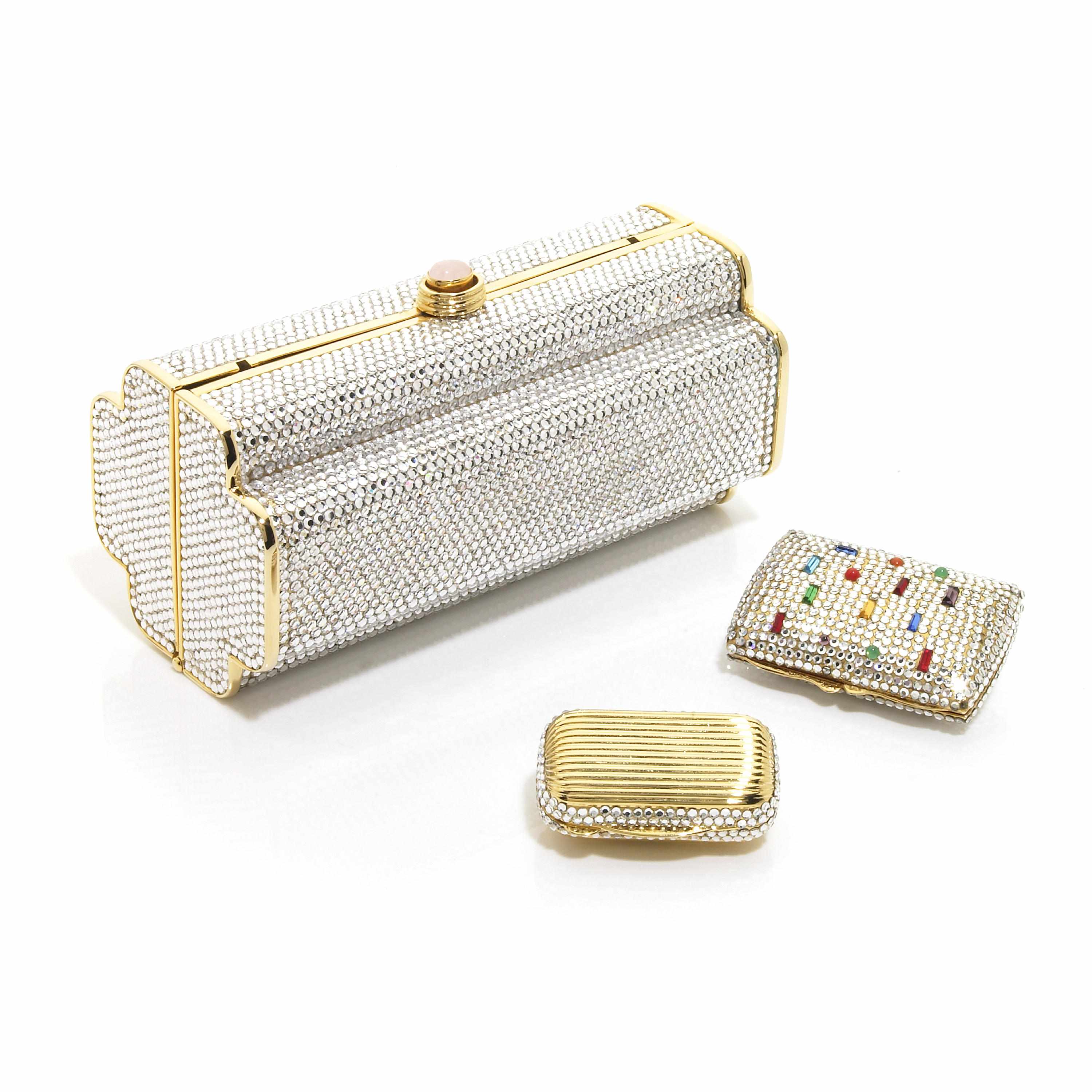 Appraisal: A silver crystal stylized purse with gold colored metal detailing