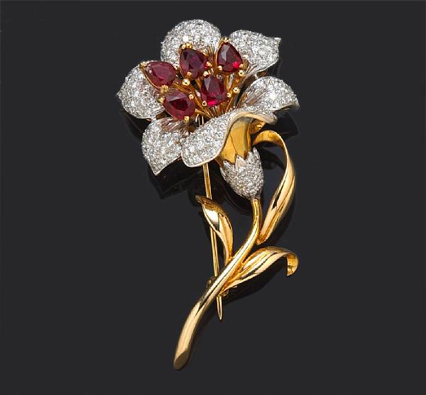 Appraisal: A ruby and diamond en tremblant floral brooch estimated total