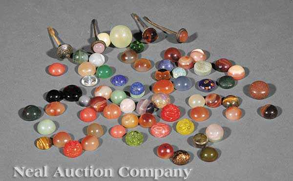 Appraisal: A Large Group of Chinese Snuff Bottle Stopper Heads approximately