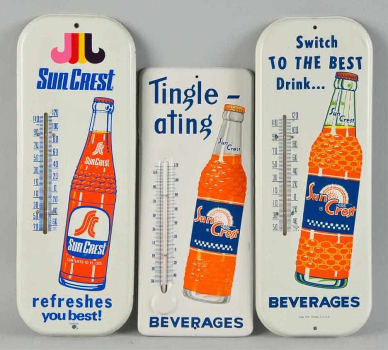 Appraisal: Lot of Tin Sun Crest Orange Thermometers Description s to