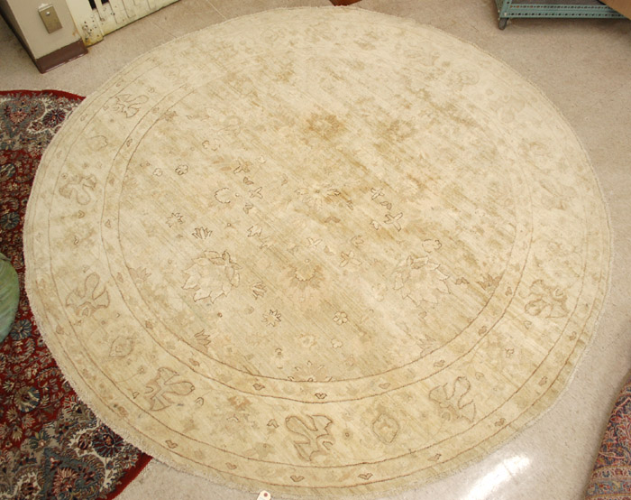 Appraisal: ROUND ORIENTAL CARPET Oushak design of West Anatolia hand knotted