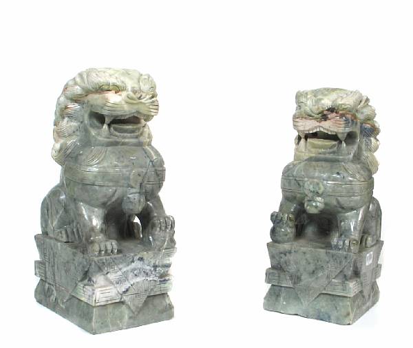 Appraisal: A pair of Chinese hardstone fu dogs height in width