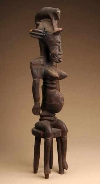 Appraisal: West African Senufo Seated Figure Description From Ivory Coast Made