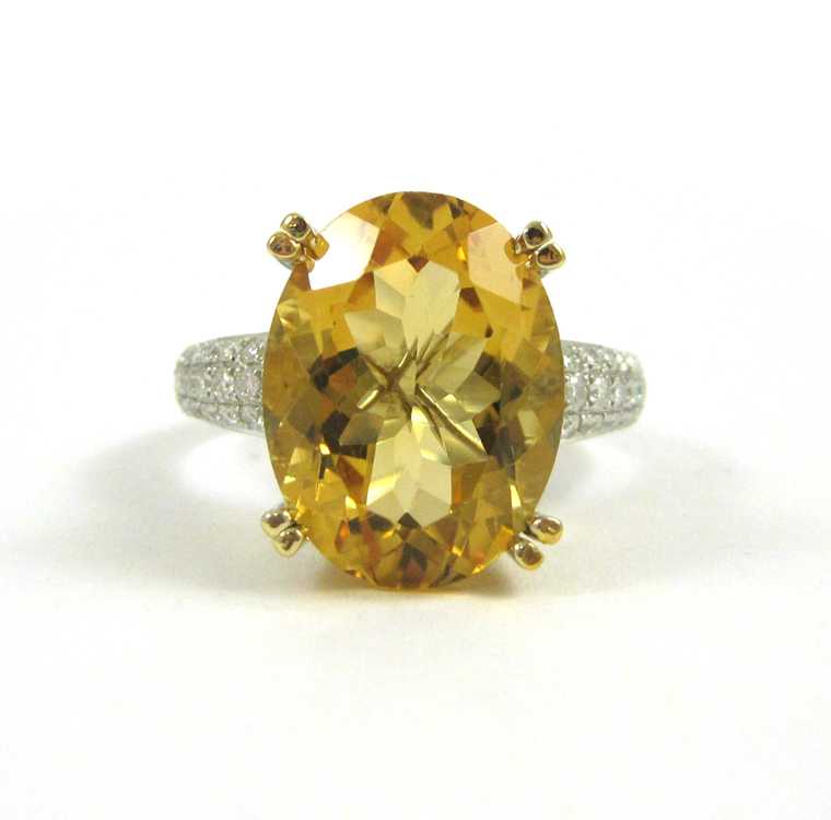 Appraisal: CITRINE DIAMOND AND FOURTEEN KARAT GOLD RING The white and