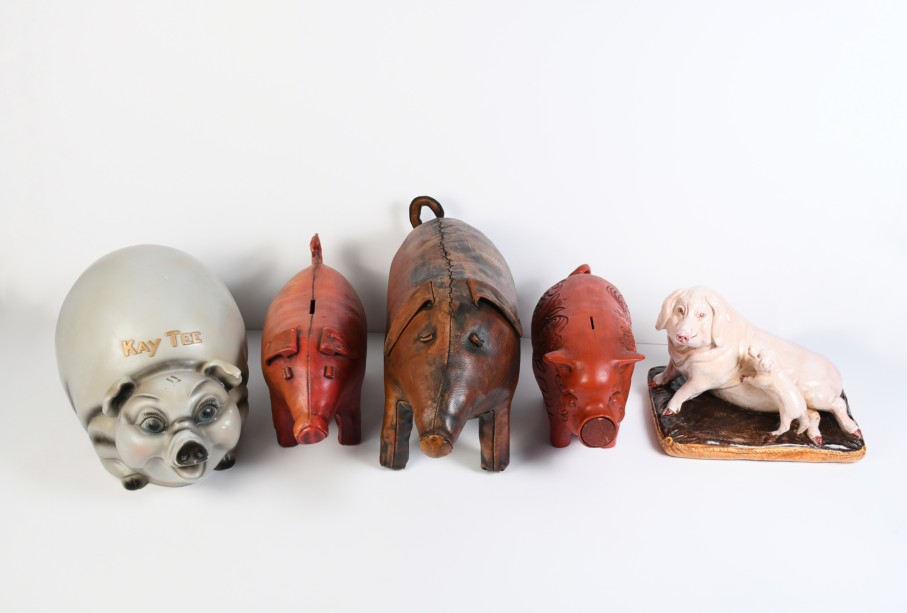 Appraisal: PC CERAMIC LEATHER PIG COLLECTION Comprising - Italian Majolica painted