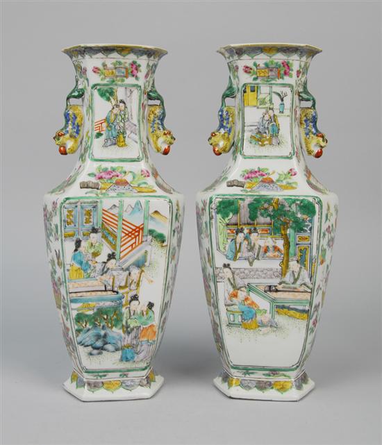 Appraisal: PAIR OF CHINESE EXPORT FAMILLE ROSE VASES with foo dog