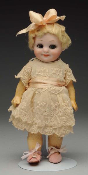 Appraisal: Impish A M Googly Doll German bisque socket head by