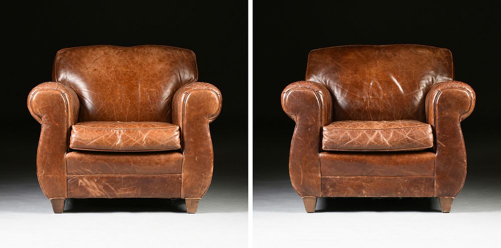 Appraisal: A PAIR OF OVERSTUFFED LEATHER ARMCHAIRS MODERN A PAIR OF