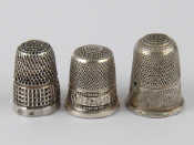 Appraisal: Three hallmarked sterling silver thimbles one by Charles Horner Chester