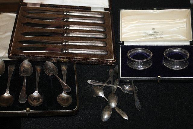 Appraisal: TWO CASED SETS OF SILVER COFFEE SPOONS together with a