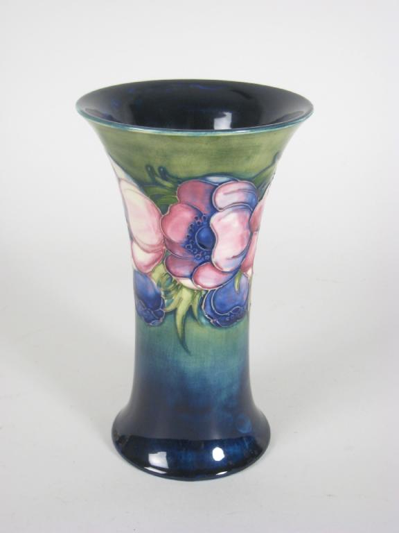 Appraisal: A Moorcroft waisted Vase Anemone pattern on a blue ground